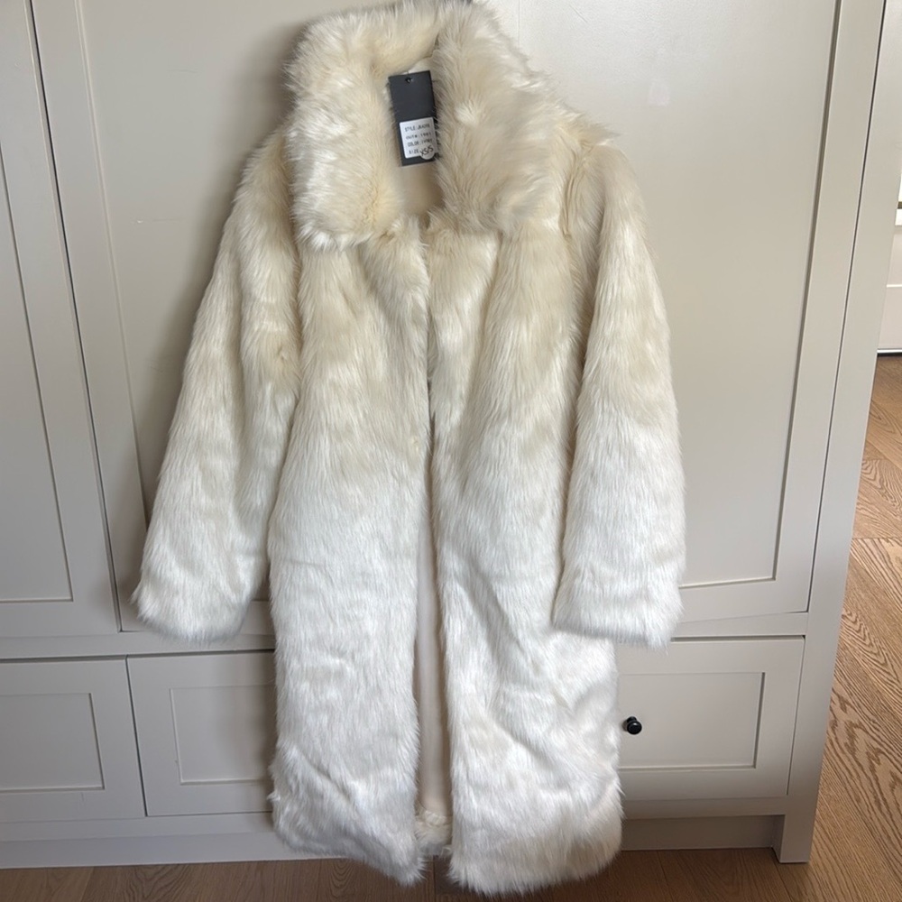 Fur trench coat in ivory